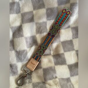 Consuela wristlet strap